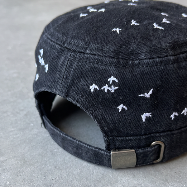 "migration" hat